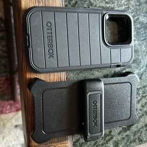 I phone black 14 pro otter box case